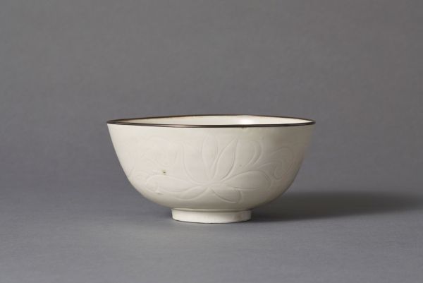 WHITE PORCELAIN BOWL WITH CARVED LOTUS SCROLL DESIGN